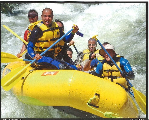 Having fun rafting.